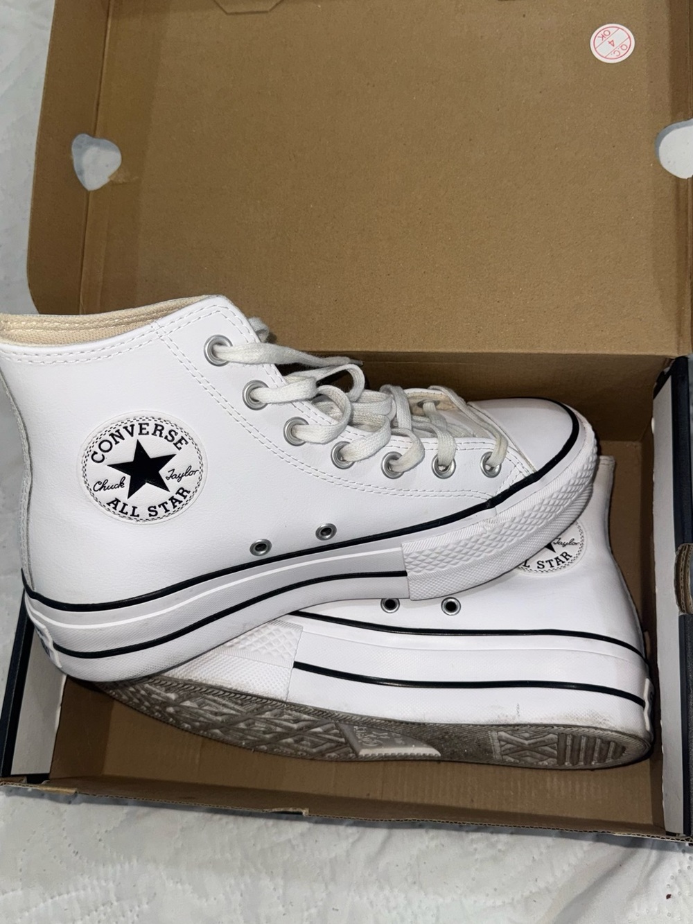 Converse White High Top Sneakers with Black Trim